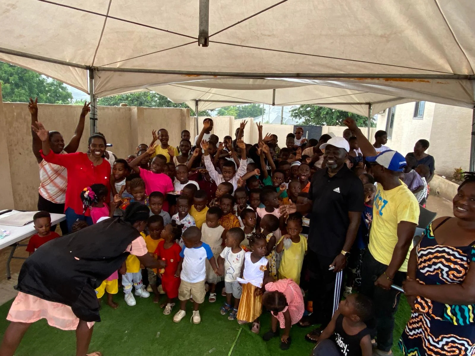 Children and families celebrating together at a community event
