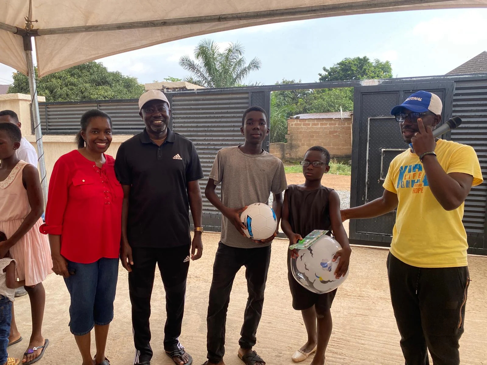 Equipping Center representatives presenting sports equipment
